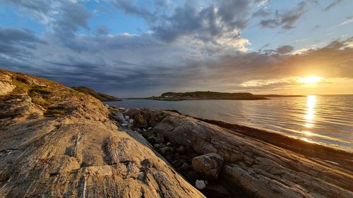 Scenic view of sea against sky during sunset