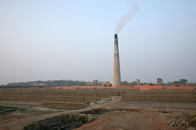 Brick factory against clear sky