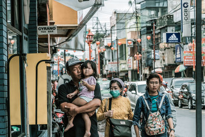 People on street in city