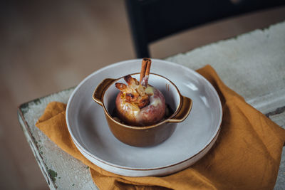 Close-up of baked apple on plate