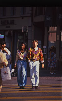 Group of people walking in city