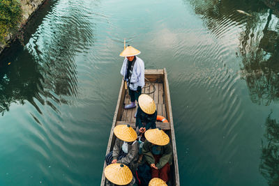 High angle view of man on boat in river