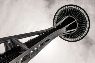 Low angle view of ferris wheel against sky