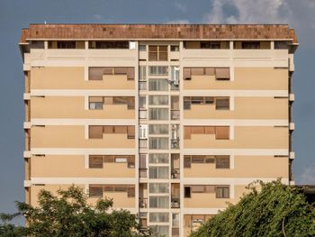 Low angle view of residential building against sky