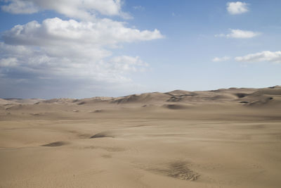Scenic view of desert against sky
