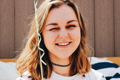 Portrait of smiling young woman