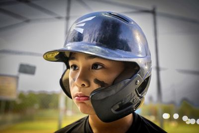 Portrait of man wearing helmet
