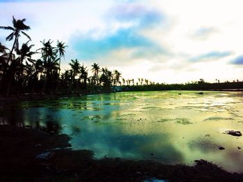 Scenic view of sea against cloudy sky