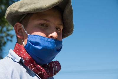 Argentinian boy wearing face mask