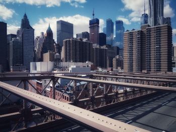 Modern buildings in city against sky