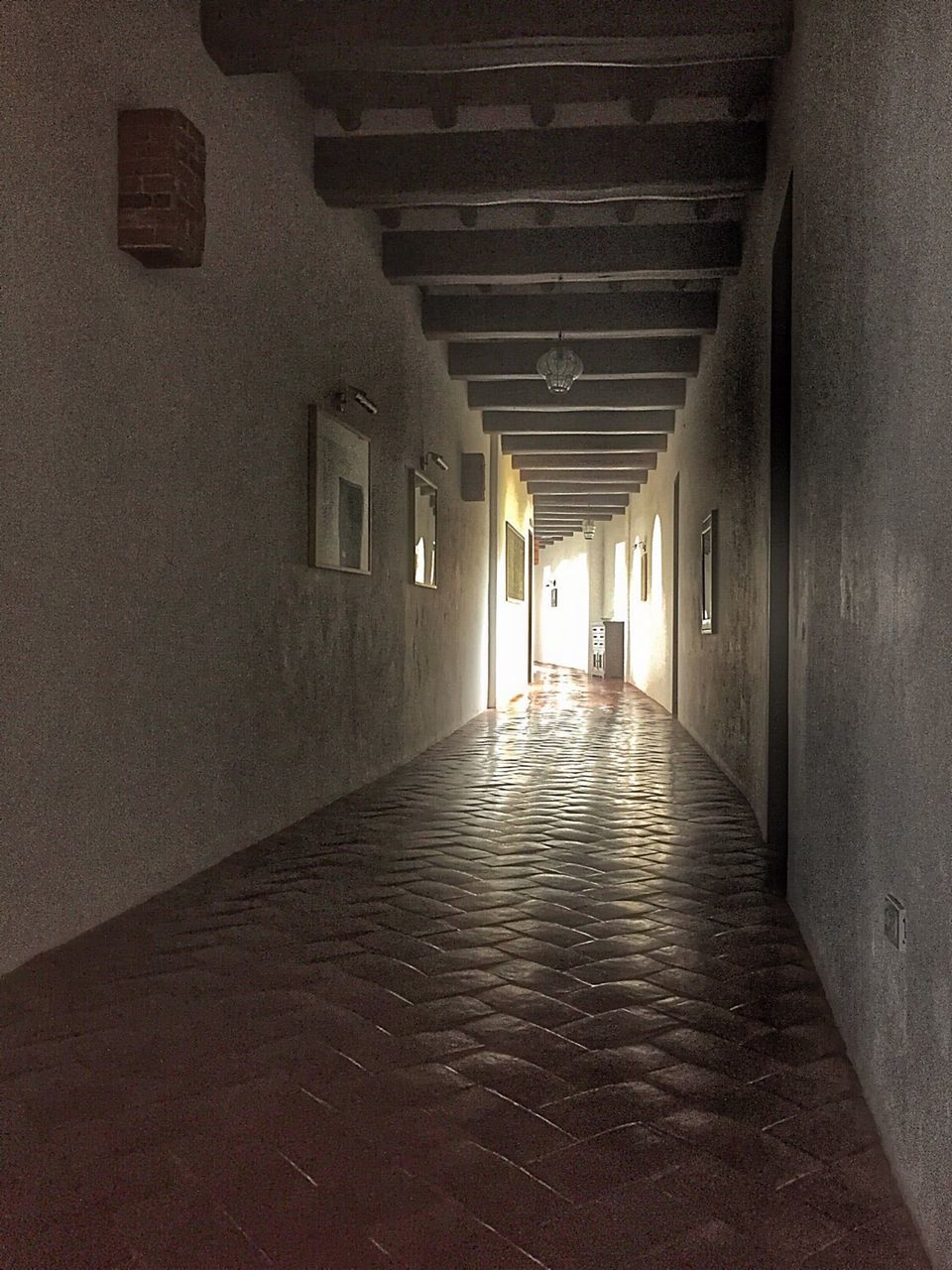 architecture, the way forward, built structure, corridor, diminishing perspective, indoors, empty, narrow, vanishing point, in a row, building exterior, building, long, illuminated, ceiling, alley, absence, lighting equipment, wall - building feature, walkway