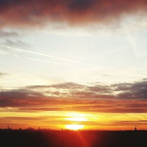 Scenic view of silhouette landscape against sky during sunset