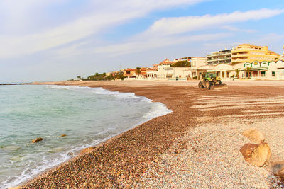 Scenic view of beach against sky