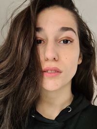 Close-up portrait of a beautiful young woman