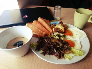 Close-up of food served on table