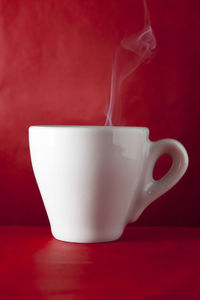 Close-up of coffee cup on table