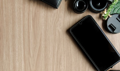 High angle view of mobile phone on table