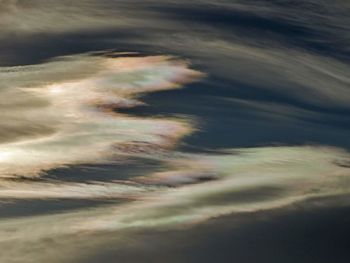 Close-up of water on beach against sky