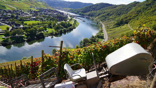 High angle view of townscape at moselle river with vineyard 