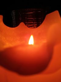 Close-up of lit tea light candle