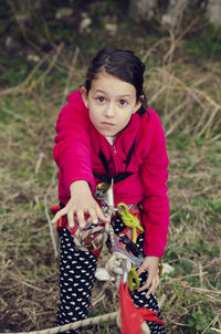 High angle portrait of girl with safety harness