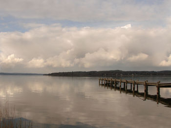 Pier on sea against sky