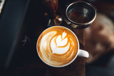 Close-up of coffee cup on table