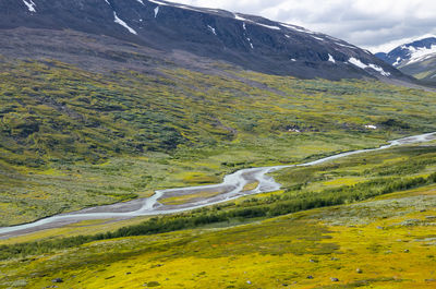 A beautiful summer landscape with rapa river rapadalen in sarek national park in sweden.