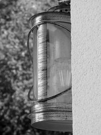 Close-up of metallic structure against wall
