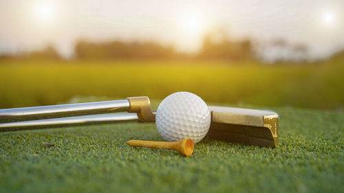 Close-up of golf ball on grass