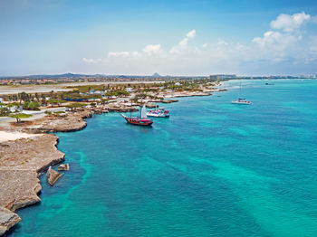 Aerial from aruba island with palm beach in the caribbean sea