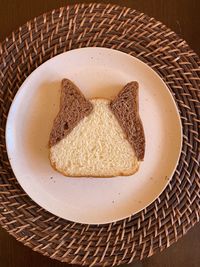 High angle view of bread in basket on table