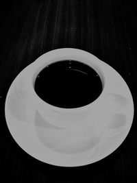 High angle view of coffee cup on table