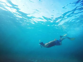 Man swimming in sea