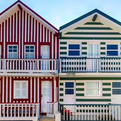 Low angle view of houses with balcony 