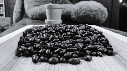 Close-up of coffee beans on table