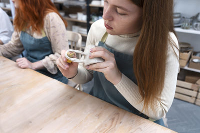 Pottery workshop class. a popular hobby is making ceramic dishes from a raw clay