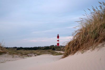 Panoramic image of the wittduen lighthouse at sunset, amrum, germany