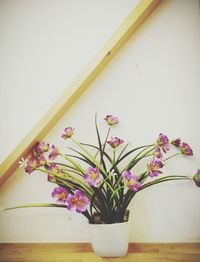 Close-up of vase on table at home