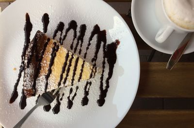 Close-up of cake served on table