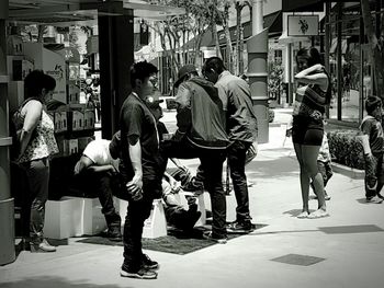 People walking on city street