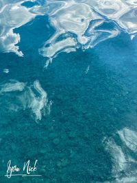 High angle view of swimming in sea