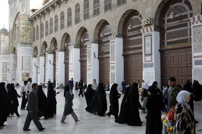 People walking at umayyad mosque