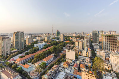 Aerial view of cityscape against sky