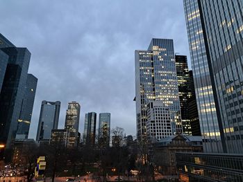 Low angle view of modern buildings against sky
