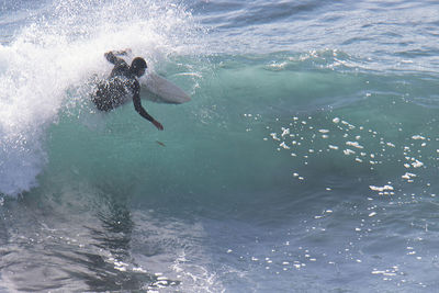 Man swimming in sea