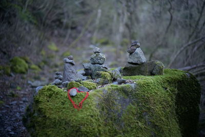 Stone sculpture on rock