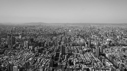 High angle view of illuminated cityscape against sky