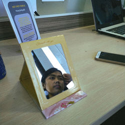 High angle view of man using laptop on table