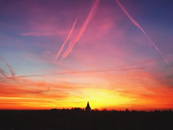 Scenic view of dramatic sky during sunset